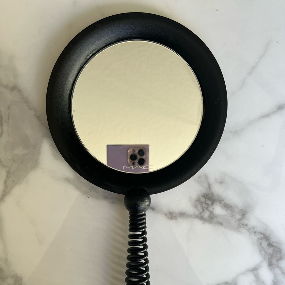 MAC Cosmetics counter mirror, retired in 2008 and never released to the public.